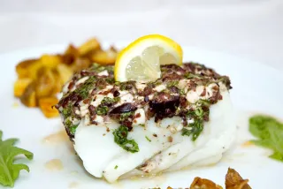 Photo of Halibut topped with Olives, Arugula and Cottage Cheese